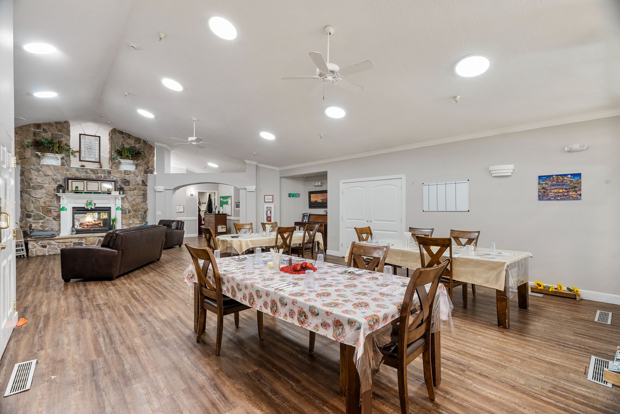 Dining area beside the stone fireplace
