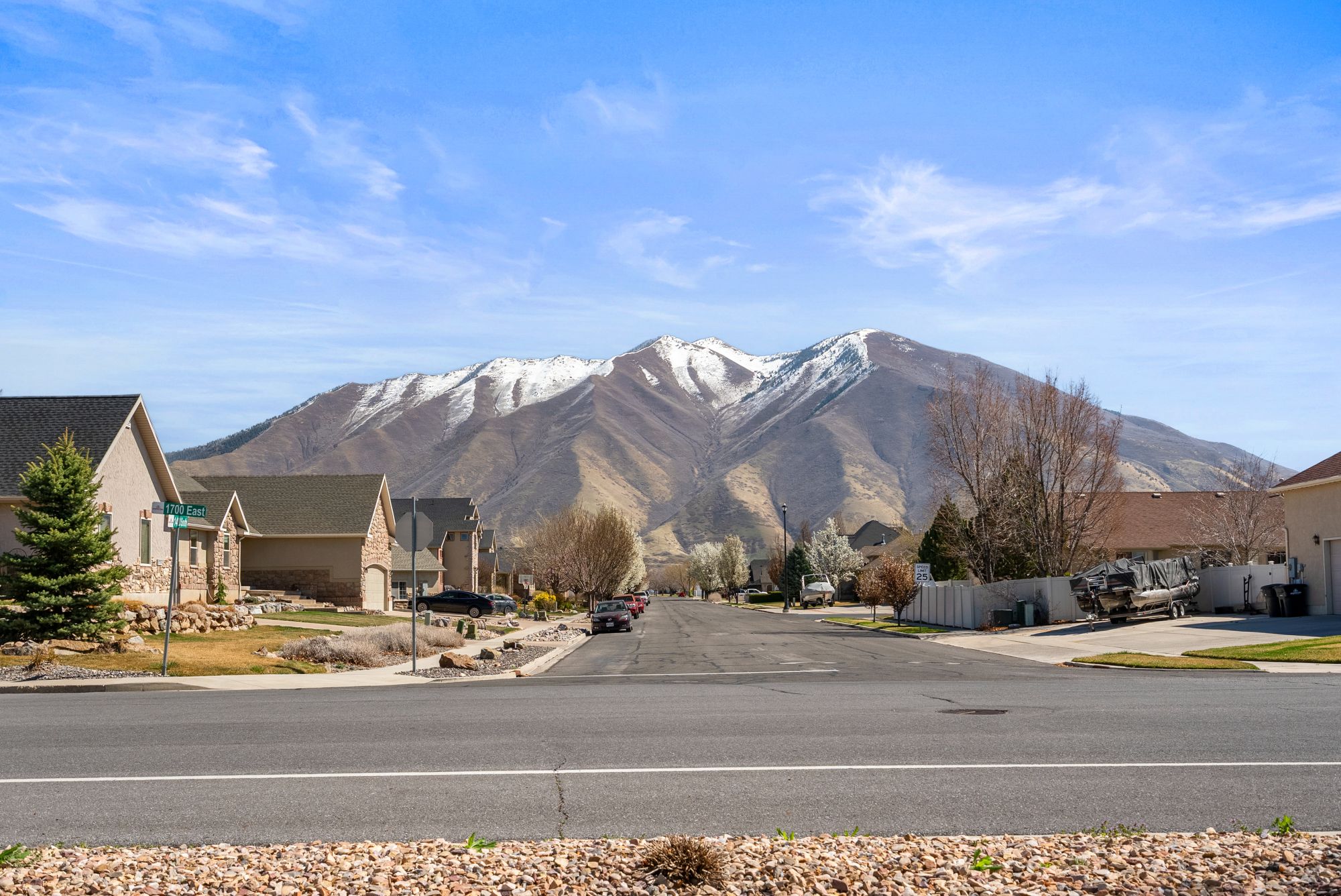 Snow-capped mountains seen from the Hearthstone Manor street